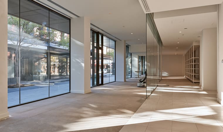Newly finished commercial fitout with hard floors and full-height glazing